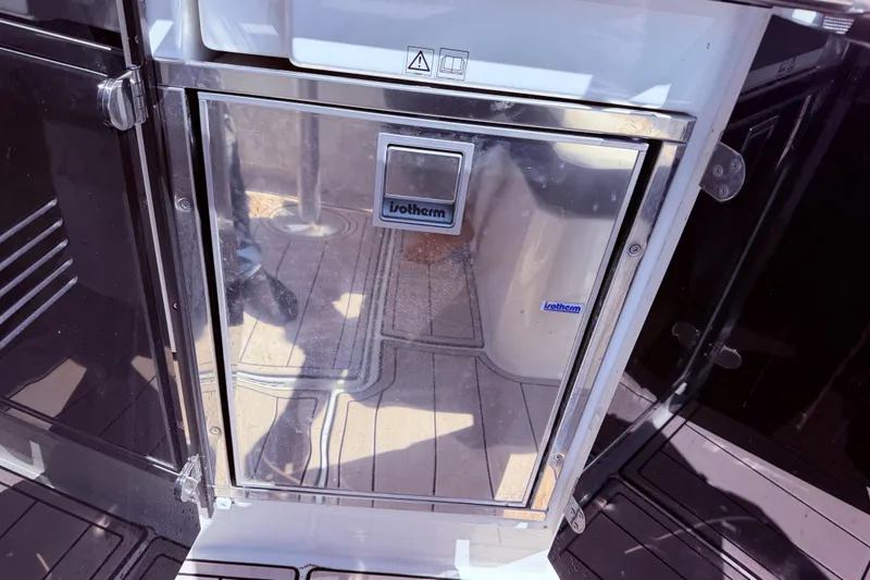 Slide: The Image of Stainless steel refrigerator on 2023 Jeanneau Leader 12.5 WA boat deck. - 22