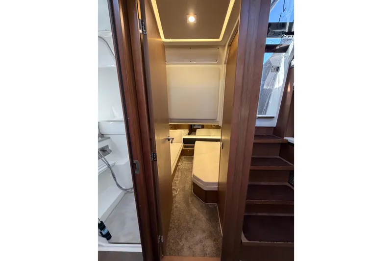 Slide: The Image of Interior cabin of 2023 Jeanneau Leader 12.5 WA with wooden finishes and modern design. - 37