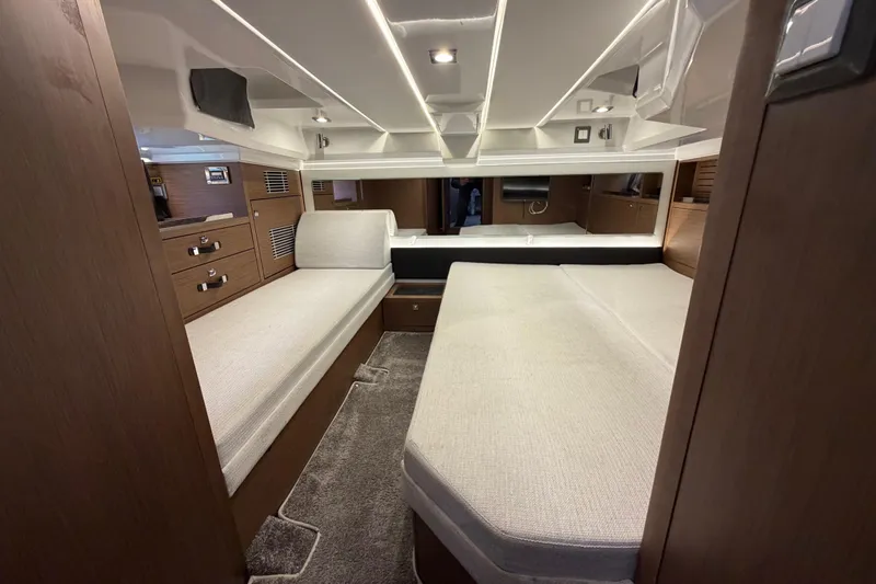 Slide: The Image of Interior cabin of 2023 Jeanneau Leader 12.5 WA, featuring modern design and comfortable seating. - 38