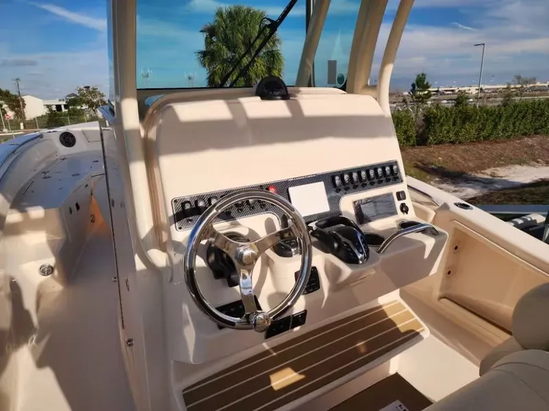 Slide: The Image of Helm console of the 2026 Grady-White 281 Coastal Explorer. - 10