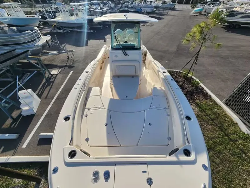 Slide: The Image of 2026 Grady-White 281 Coastal Explorer docked, front view. - 11