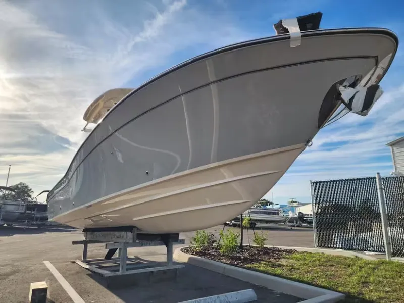 Slide: The Image of Grady-White 281 Coastal Explorer 2026 on a parking lot. - 3