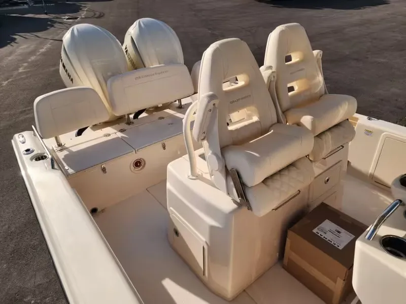 Slide: The Image of Grady-White 281 Coastal Explorer 2026 with luxurious seating and dual engines. - 9