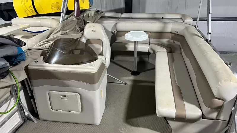 Slide: The Image of Interior of a 2005 Smoker Craft Sun Cruiser pontoon boat. - 5