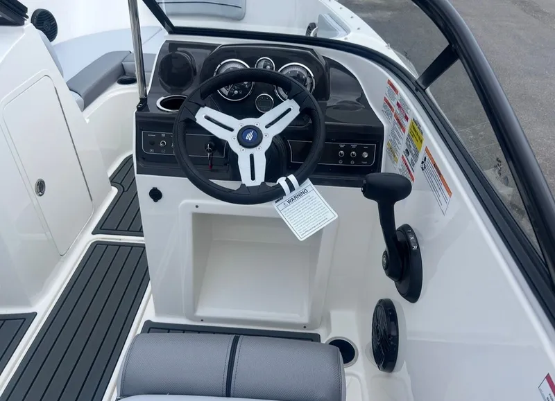 Slide: The Image of Interior view of 2026 Bayliner VR4 Bowrider OB helm. - 10