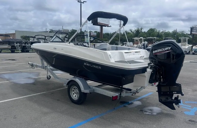Slide: The Image of 2026 Bayliner VR4 Bowrider OB with Mercury engine on trailer. - 6