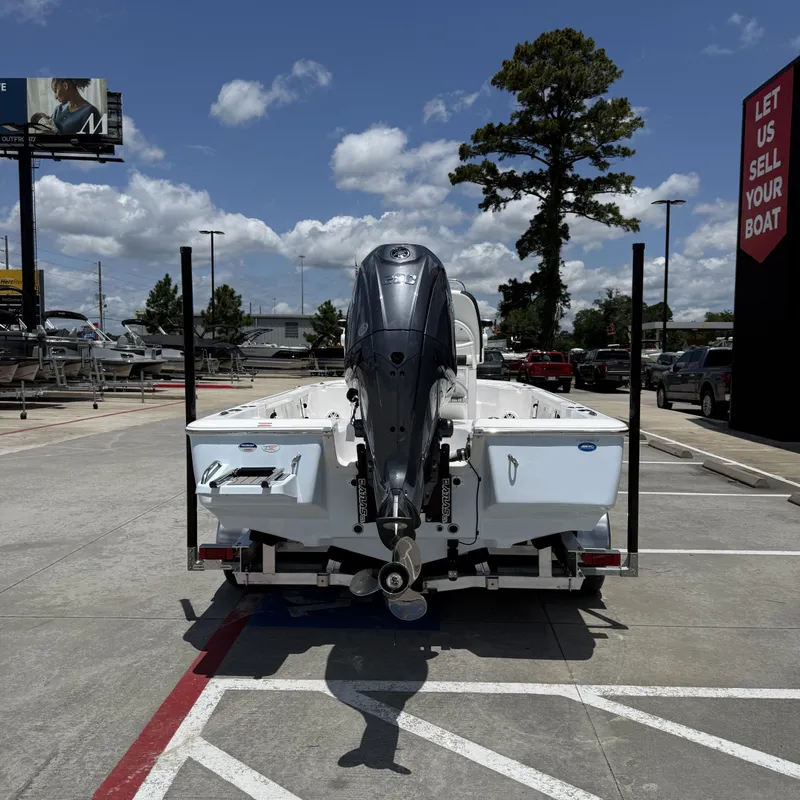 Slide: The Image of 2026 Tidewater 2110 Bay Max boat displayed in parking lot. - 8
