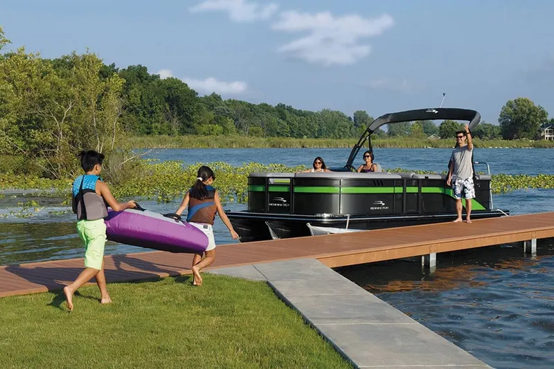 Slide: The Image of Family enjoying boat outing on Bennington 20 SXSB pontoon boat. - 10