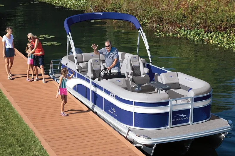Slide: The Image of Family enjoying a boat ride on Bennington 20 SXSB pontoon boat, 2023 model. - 6