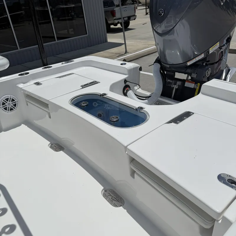 Slide: The Image of 2026 Tidewater 2110 Bay Max boat with engine and storage. - 21