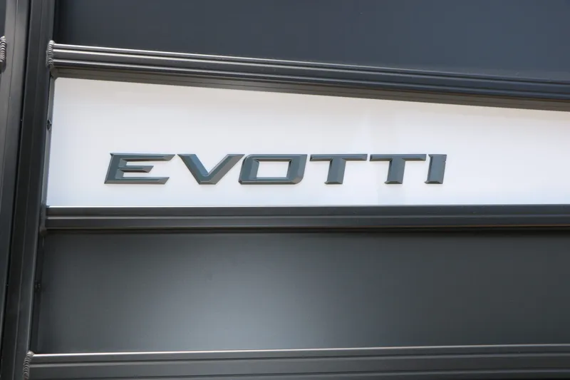 Slide: The Image of Evotti 725 CS Arch Tri Toon 2026 logo on black background. - 21