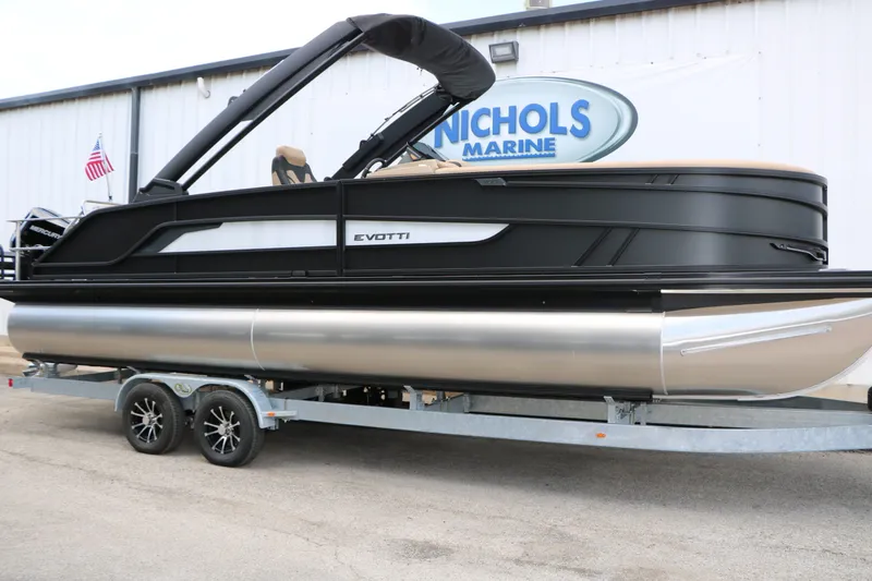 Slide: The Image of Evotti 725 CS Arch Tri Toon 2026 on trailer at Nichols Marine. - 3