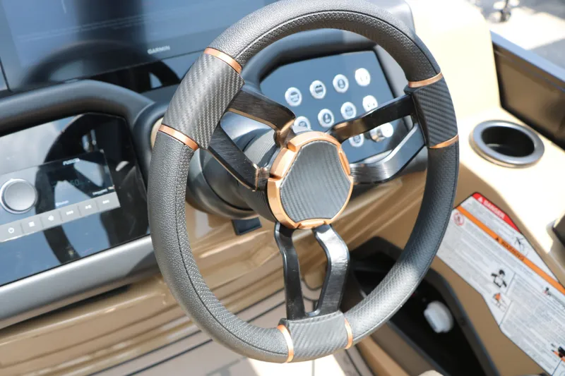 Slide: The Image of Steering wheel of the 2026 Evotti 725 CS Arch Tri Toon. - 35