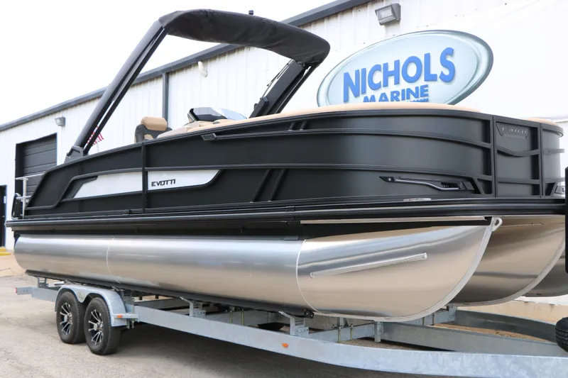 Slide: The Image of Evotti 725 CS Arch Tri Toon 2026 on trailer at Nichols Marine. - 6