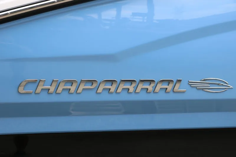 Slide: The Image of Chaparral 21 SSi 2026 logo on blue background. - 12