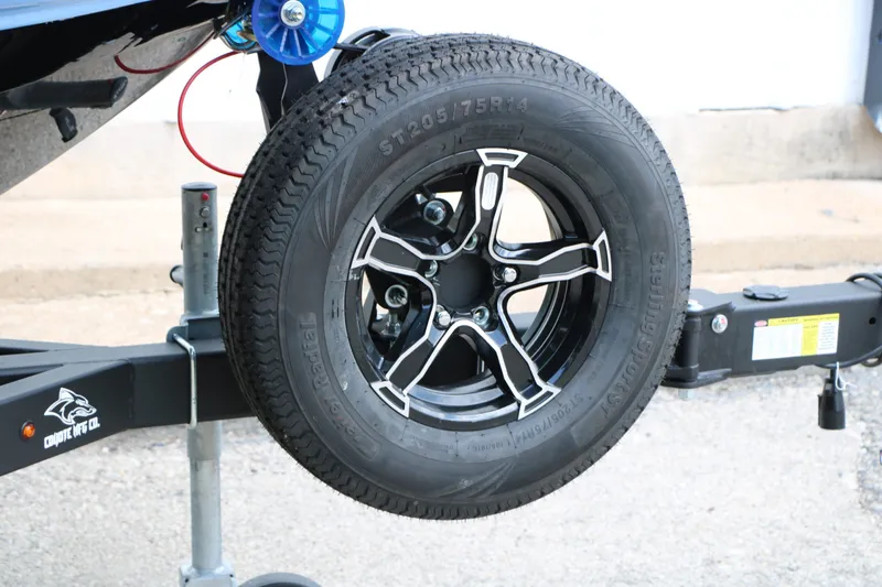 Slide: The Image of Chaparral 21 SSi 2026 trailer tire and wheel close-up. - 16
