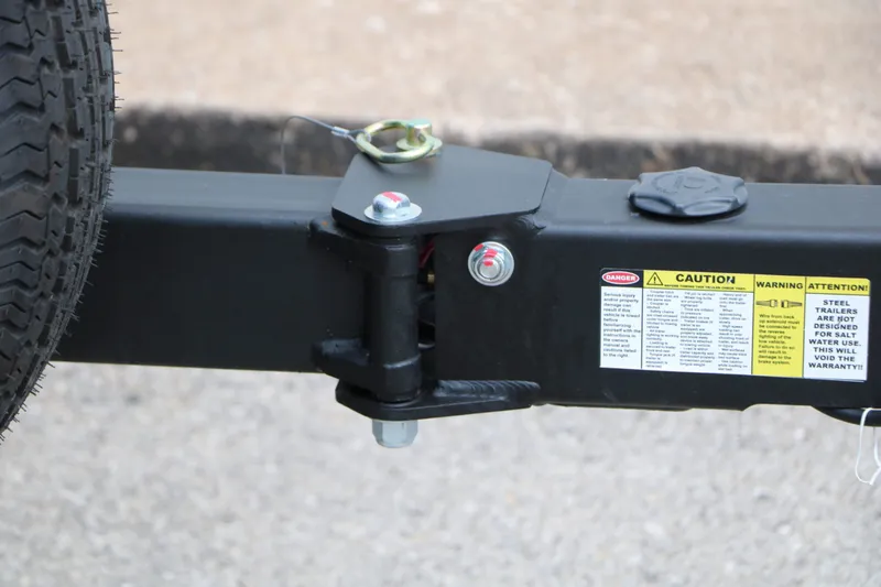 Slide: The Image of Close-up of trailer with warning labels, Chaparral 21 SSi 2026. - 17