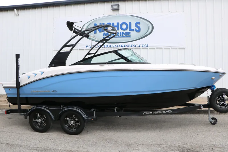 Slide: The Image of 2026 Chaparral 21 SSi boat on trailer at Nichols Marine. - 2