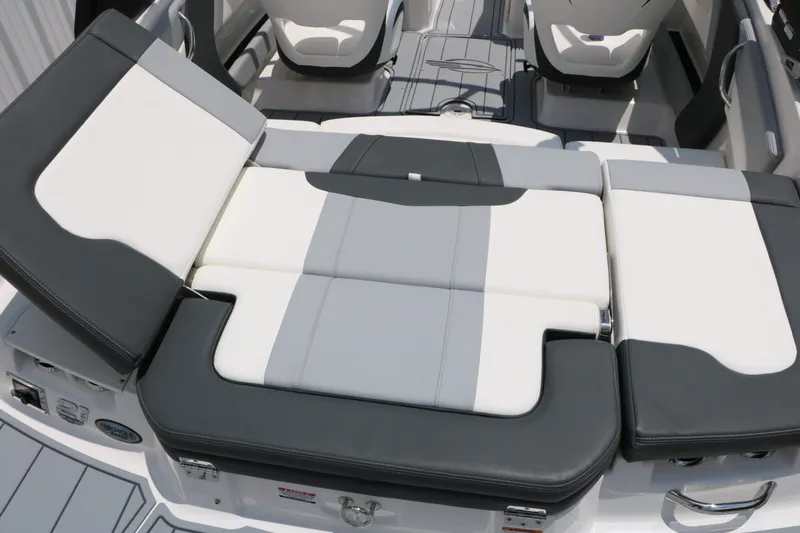 Slide: The Image of Chaparral 21 SSi 2026 boat interior with gray and white seating. - 24