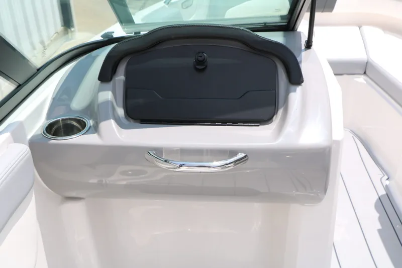 Slide: The Image of Interior of 2026 Chaparral 21 SSi with cup holder. - 33