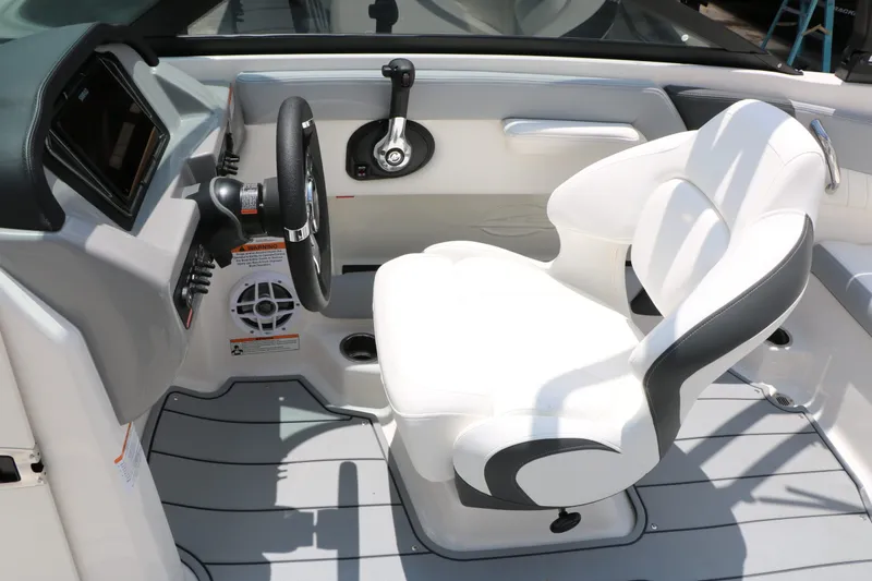 Slide: The Image of Interior of 2026 Chaparral 21 SSi with white seat and steering. - 37