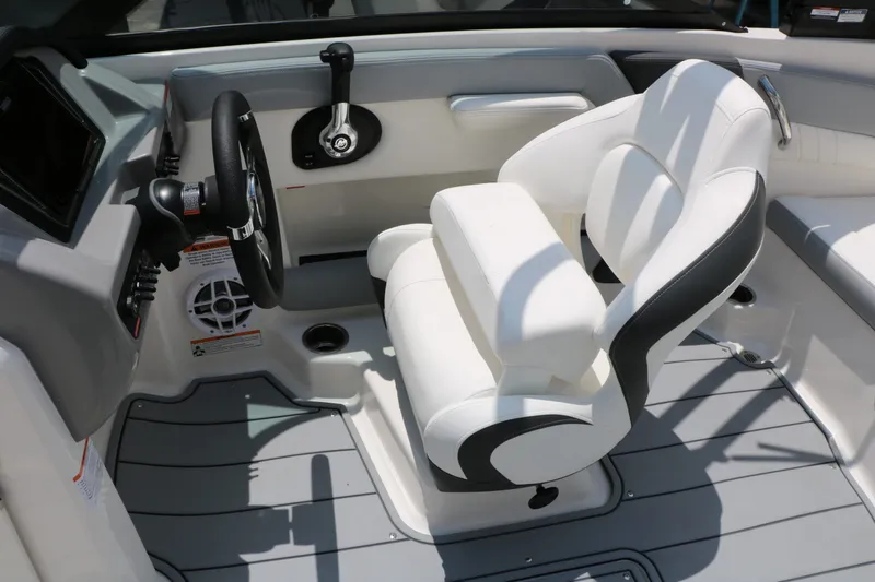Slide: The Image of Interior of 2026 Chaparral 21 SSi with white seat and controls. - 38