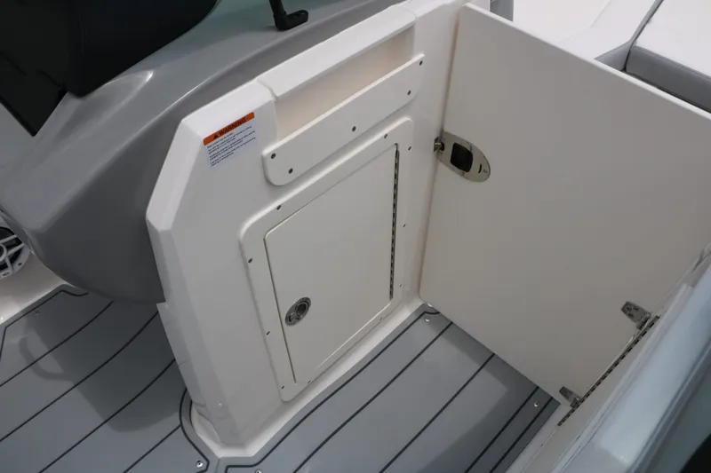 Slide: The Image of Interior of 2026 Chaparral 21 SSi featuring storage compartment. - 44
