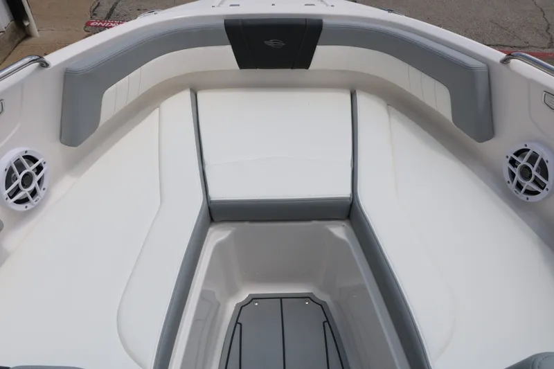 Slide: The Image of Interior of 2026 Chaparral 21 SSi with gray and white seating. - 45