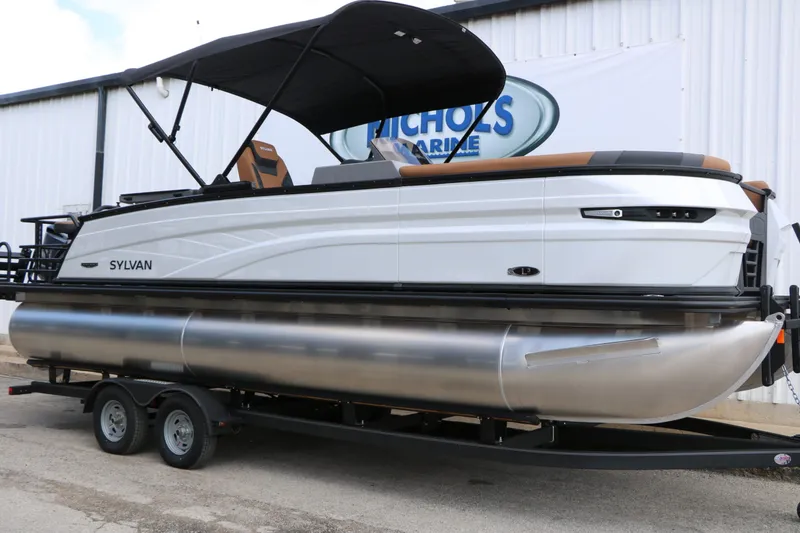 Slide: The Image of 2026 Sylvan L3 DLZ Bar Platinum Edition Tri Toon on trailer. - 4