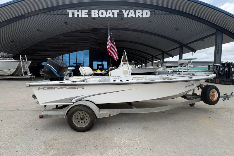 Slide: The Image of 2004 Kenner 18-V boat on trailer at The Boat Yard dealership. - 3