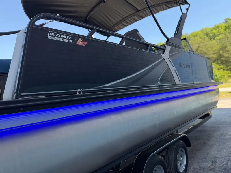 Slide: The Image of 2026 Avalon 2385 LSZ VRB pontoon boat with blue LED lighting. - 18
