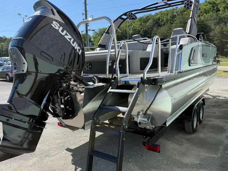 Slide: The Image of 2026 Avalon 2585 Excalibur boat with Suzuki engine, rear view. - 13