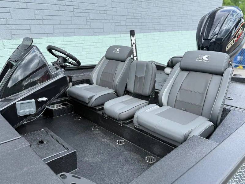 Slide: The Image of Interior of 2026 Xpress X19 Pro with gray seating. - 5