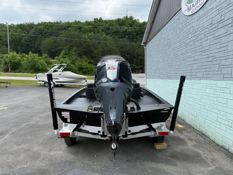 Slide: The Image of Rear view of 2026 Xpress X19 Pro boat on a trailer. - 8