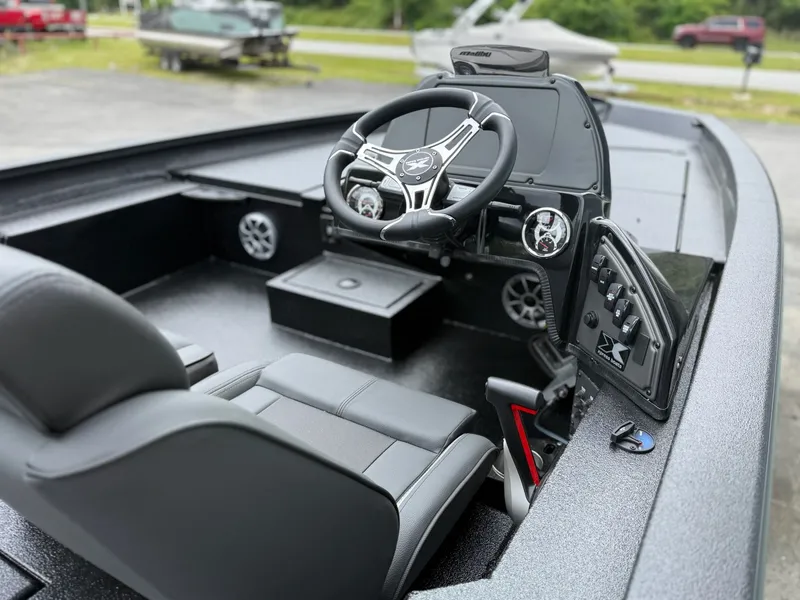 Slide: The Image of Interior of 2026 Xpress X19 Pro with modern helm station. - 9