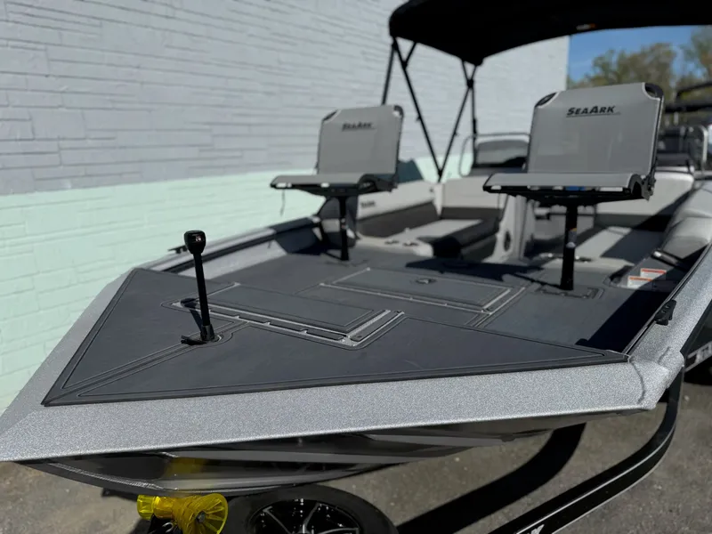 Slide: The Image of 2026 SeaArk Easy 200 boat with modern seating and gray deck. - 4