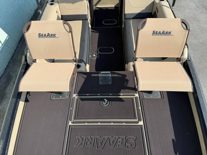 Slide: The Image of Interior of SeaArk Easy 200 boat, 2026 model, featuring beige seats. - 12