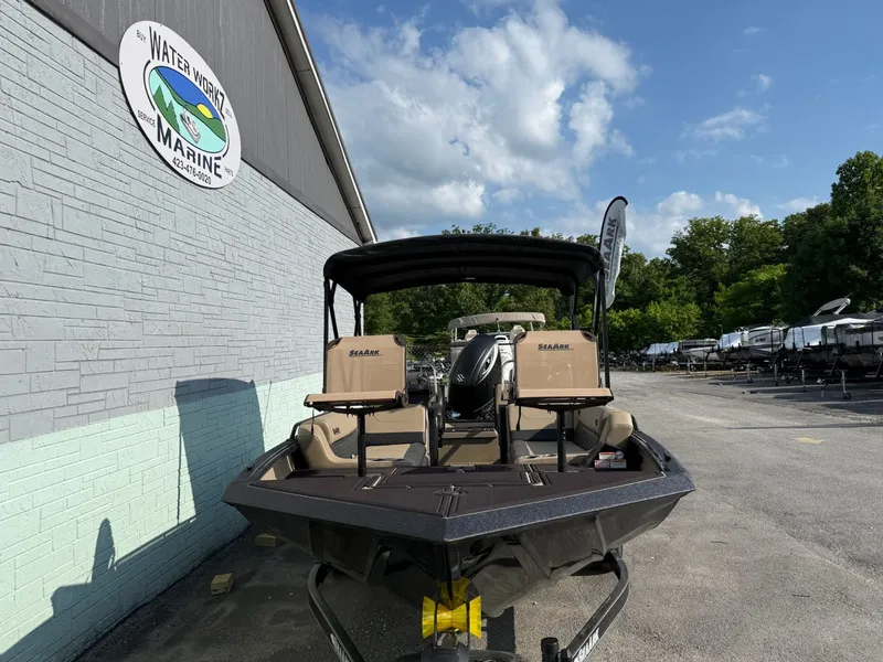 Slide: The Image of SeaArk Easy 200 boat, 2026 model, outside a marine store. - 3