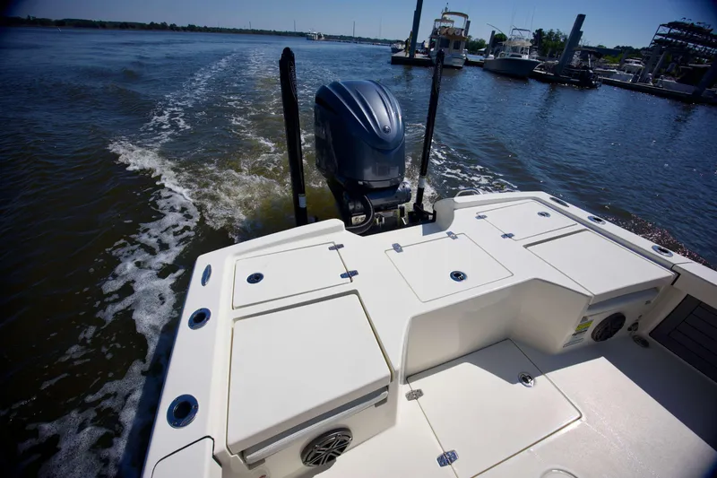 Slide: The Image of 2024 Pathfinder 2500 Hybrid boat cruising on a sunny day, showcasing its sleek design and powerful engine. - 41