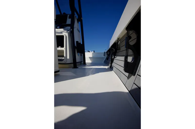 Slide: The Image of 2024 Pathfinder 2500 Hybrid boat deck with sleek design and modern features. - 52
