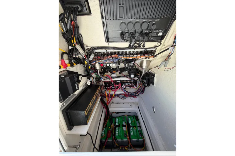Slide: The Image of Electrical system of 2024 Pathfinder 2500 Hybrid boat, showcasing wiring and battery setup. - 64