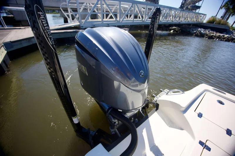 Slide: The Image of 2024 Pathfinder 2500 Hybrid boat with Yamaha outboard motor at dock. - 69