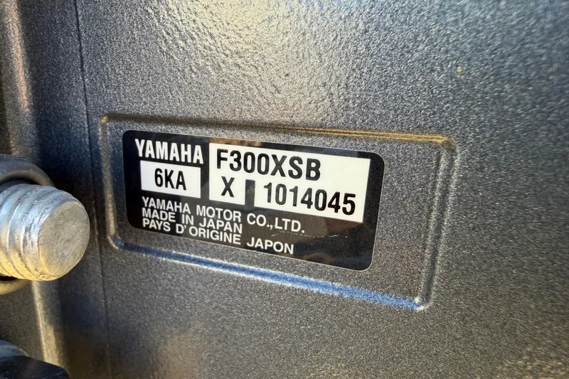 Slide: The Image of Yamaha F300XSB engine label on 2024 Pathfinder 2500 Hybrid, made in Japan. - 76