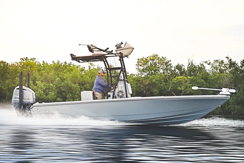 Slide: The Image of Manufacturer Provided Image: 2024 Pathfinder 2500 Hybrid boat cruising on water. - 80