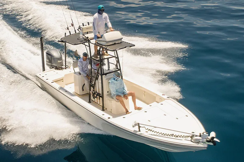 Slide: The Image of Manufacturer Provided Image: 2024 Pathfinder 2500 Hybrid boat cruising on clear blue water. - 83