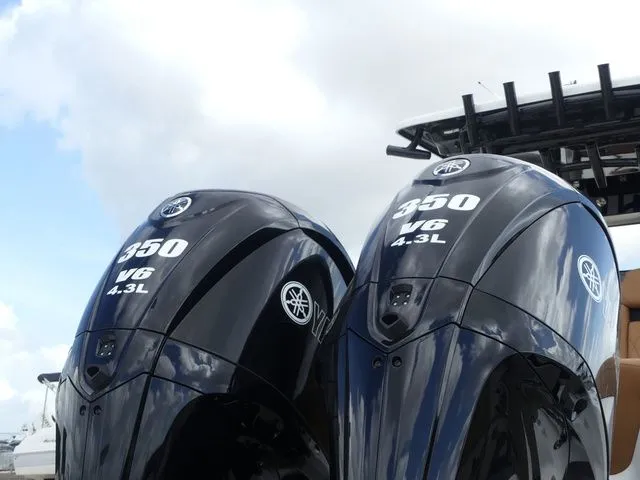 Slide: The Image of Two Yamaha 350 V6 outboard engines on a Key West 291 FS boat. - 10