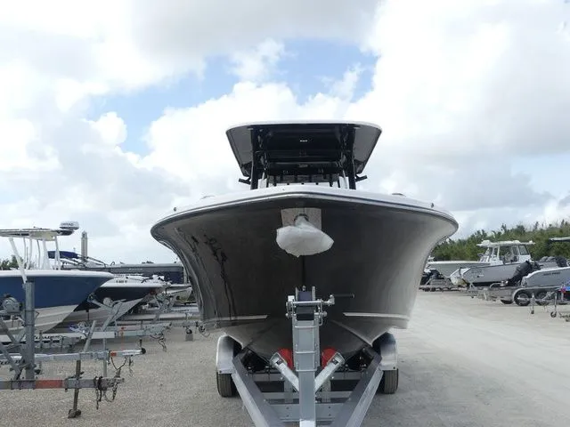 Slide: The Image of 2026 Key West 291 FS boat on a trailer. - 2