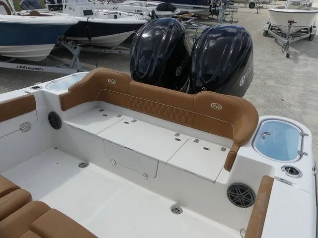 Slide: The Image of Interior of a 2026 Key West 291 FS boat with brown seating. - 20