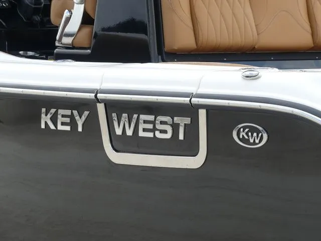 Slide: The Image of Key West 291 FS boat, close-up of logo, year 2026. - 7