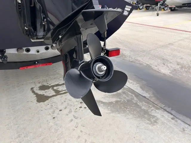 Slide: The Image of Propeller of a 2022 Tracker Pro Team 175 TXW on concrete surface. - 4